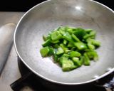 A picture of step 1 of Shimla mirch potato sabji.