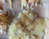 A picture of step 5 of Cheesy new potato squares.