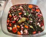 A picture of step 1 of Marinated Braised Pork Shoulder with Tomatoes and Bacon.