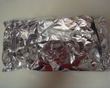 A picture of step 4 of Baked Cod in Foil.