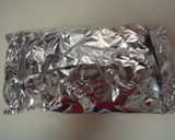 A picture of step 4 of Baked Cod in Foil.