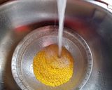 A picture of step 1 of Yummy makkhan wali moong ki daal with zeera rice.