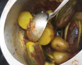 A picture of step 3 of Stuffed brinjals in cooker.