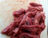 A picture of step 2 of My Sticky Beef Strips marinated in a lovely Sauce.