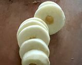 Une image de l'étape 1 de Pommes au four farcies à la banane jus au rhum toppings raisins secs et noisettes 🍎🍏.