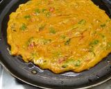 A picture of step 3 of Masala Besan Chilla with Thin Crust.