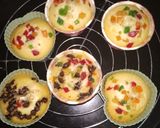 A picture of step 4 of Tutty fruity cup cake.