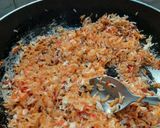 A picture of step 4 of Orange pulao.