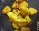 A picture of step 3 of Luchi and Aloo Dum.