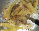 A picture of step 9 of Chinese Loaded fries.