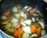 A picture of step 9 of Grandma’s Kenchin-jiru (Vegetable Soup with Dumplings).