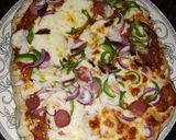A picture of step 4 of Sausage pizza.