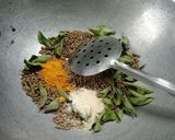 A picture of step 2 of Rasam Masala.