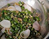 A picture of step 6 of Okra-Onion Fry.