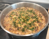 Foto del paso 9 de la receta: Arroz de chipirones y alcachofas