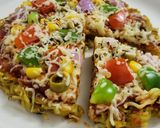A picture of step 7 of Maggi Pizza.
