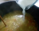 A picture of step 5 of Chicken soup with garlic bread.
