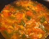 A picture of step 9 of Creamy Chicken and Vegetable Paella.