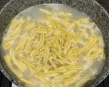 Foto del passaggio 4 della ricetta Fusilli (fatti in casa) con il pesto di basilico e nocciole 🍝🌱