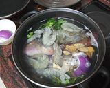 Foto del paso 1 de la receta: Paella de bacalao, calamares, mejillones y langostinos