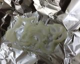 A picture of step 2 of Easy Pork Tenderloin Foil Bake.