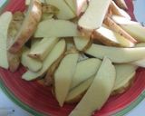 A picture of step 2 of Spiced potato wedges#Festive dish contest Nairobi West.