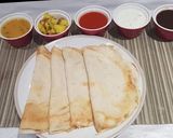 A picture of step 4 of Proso millet ghee dhosa.