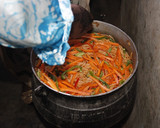 A picture of step 4 of Jollof Spaghetti with veggies.