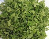 A picture of step 1 of Thankuni Pata Bora (Centella Leaves Fritters / Pakoras - Bengali Style).