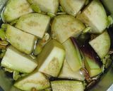 A picture of step 1 of Broad bean seeds and Brinjal sabji.