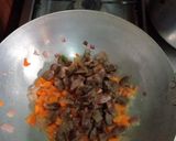 A picture of step 2 of Stir fried potatoes with veggies and gizzard.