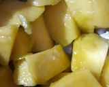 A picture of step 1 of Sweet Mango Rava Appe.