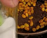 A picture of step 2 of Masala Edmame (Stir Fried green soy beans).