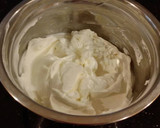 A picture of step 16 of Vanilla Layer Cake with Lemon Cream Filling and Lemon Whipped Cream Frosting.
