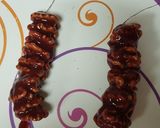 A picture of step 6 of Georgian walnut churchkhela or walnut candy.