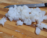 Foto del paso 4 de la receta: Calabacín relleno de bacalao con tomate