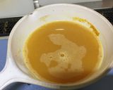 A picture of step 8 of Aunty Eiko's Orange Juicy Cake.