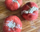 A picture of step 2 of Saturn Peaches with Prosciutto and Yorkshire Blue.