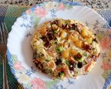 A picture of step 3 of Oven-Baked Potato Omelette Stuffed with Ham and Cheese.