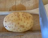 A picture of step 1 of Hassleback Potato.