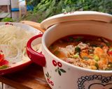 A picture of step 2 of Tomato Hủ Tiếu Noodle Soup.