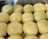 A picture of step 14 of Coconut Sesame Seeds Dinner Rolls.