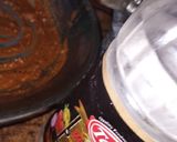 A picture of step 2 of Achari chicken broast.