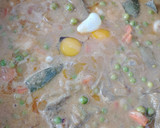 Foto del paso 14 de la receta: Alcauciles con guisantes, gambas y huevos