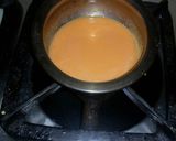 A picture of step 10 of Tricolor fruit custard tricolor chocolate bowl.