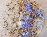A picture of step 2 of Savoury Rosemary Flower Egg in a Hole.