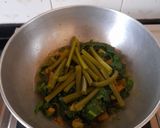A picture of step 4 of Pui Saag or Malabar Spinach.