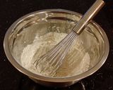 A picture of step 3 of White Peppermint Layer Cake with a White Peppermint Cream.