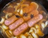 A picture of step 2 of Braised Pork Belly & Sausage.