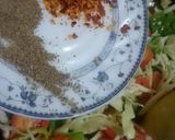 A picture of step 8 of Spicy BBQ chicken ricewith stir fry vegetables.